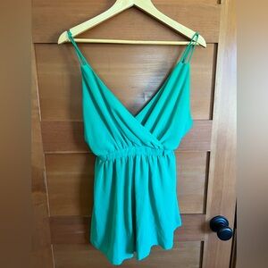 Vibrant Green Sleeveless Romper shorts